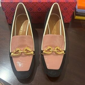 Pink patent  leather with gold accessories and black suede